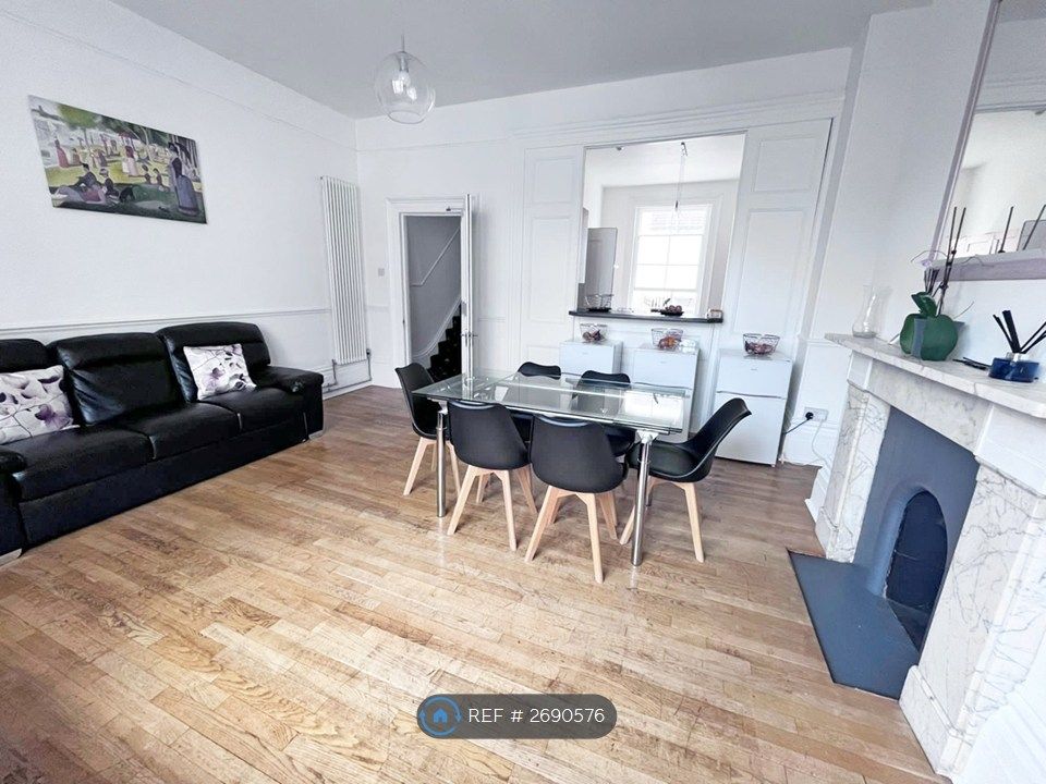 Property photo 2 of 17 Living Room: Dining Seating For 8, 2 Large Sofas