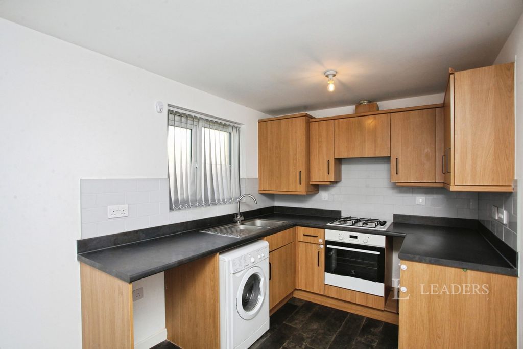 Property photo 3 of 12 Kitchen