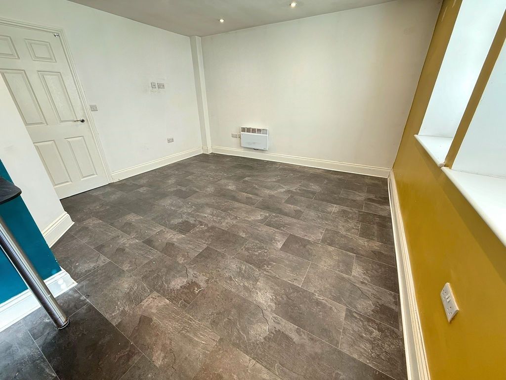 Property photo 2 of 6 Living Area