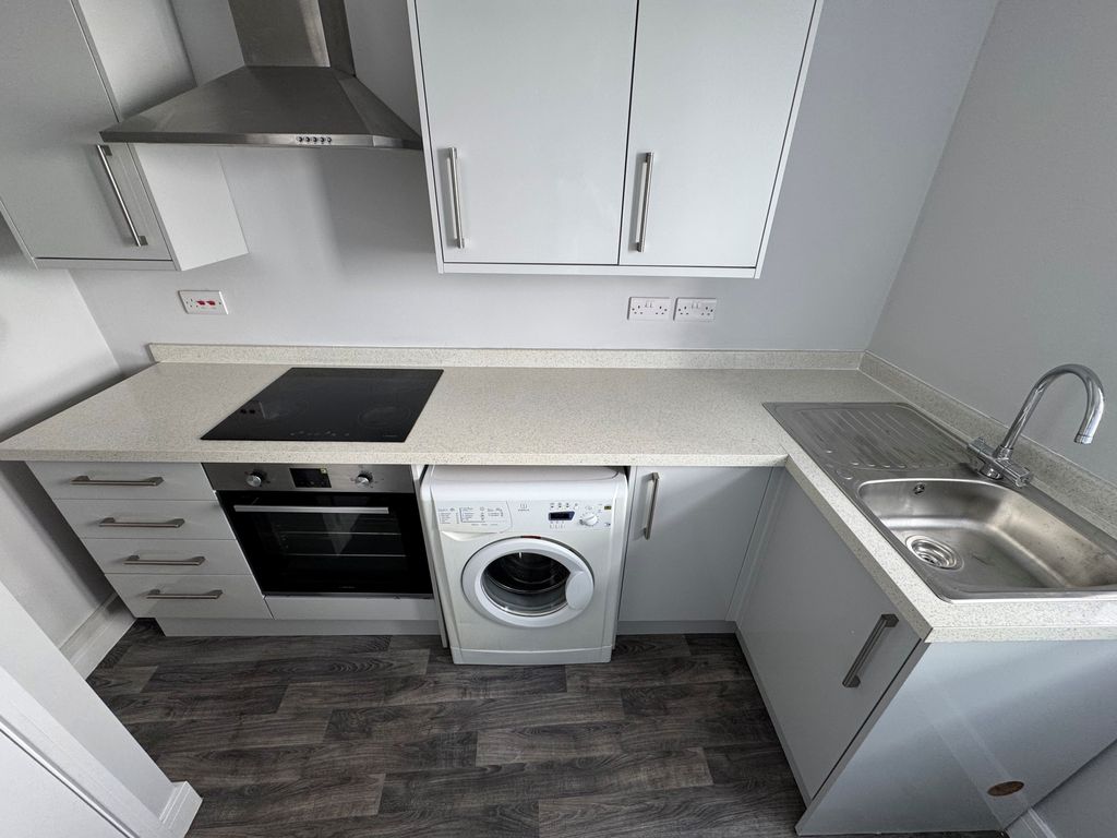 Property photo 1 of 3 Kitchen