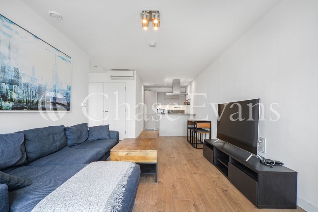 Property photo 3 of 12 Living Area