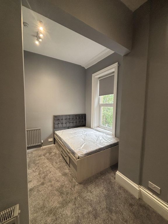 Property photo 3 of 28 A Well-Lit, Modern Master Bedroom Featuring A Larg...