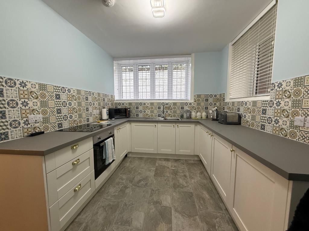 Property photo 3 of 9 Tiled Kitchen With Dual Aspect Windows