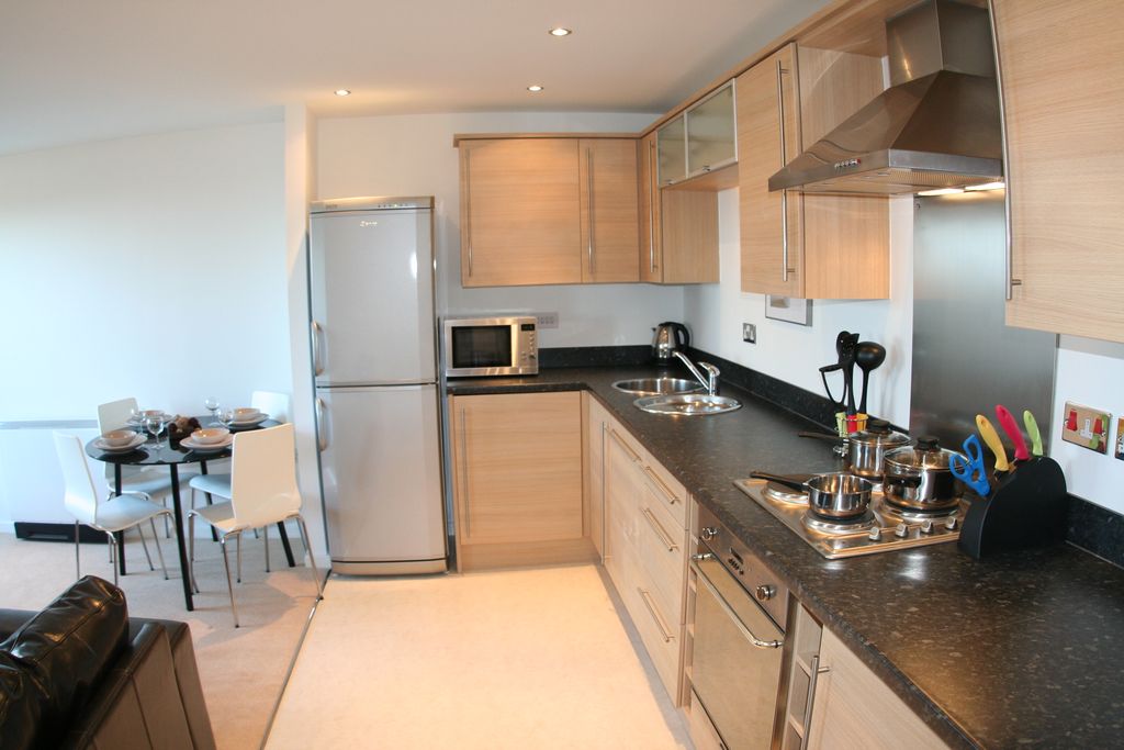 Property photo 2 of 7 Kitchen Area