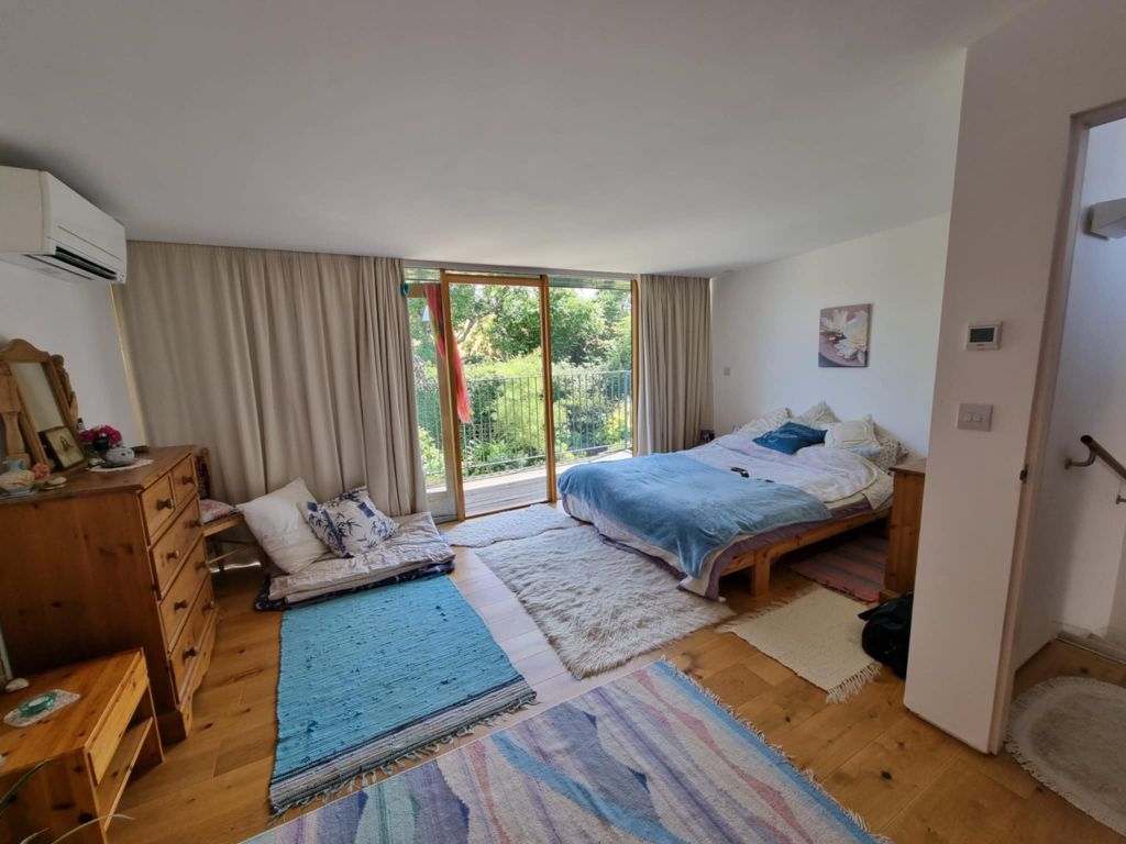 Property photo 2 of 24 Upstairs Bedroom