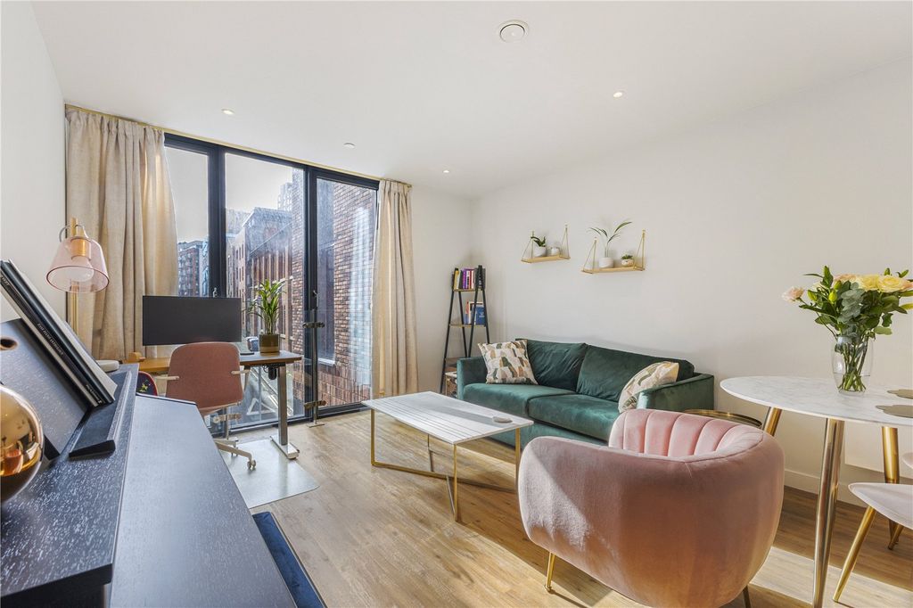 Property photo 2 of 16 Living Area