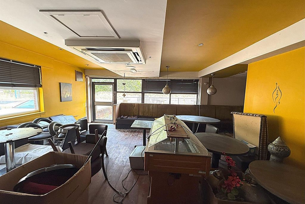 Property photo 2 of 3 Bright Communal Lounge With Seating And Windows...