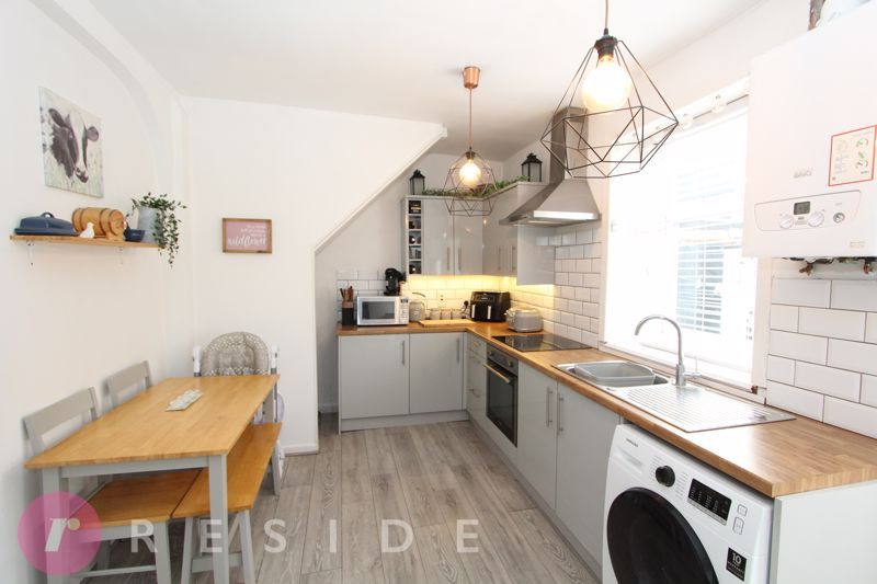 Property photo 3 of 14 Dining Kitchen