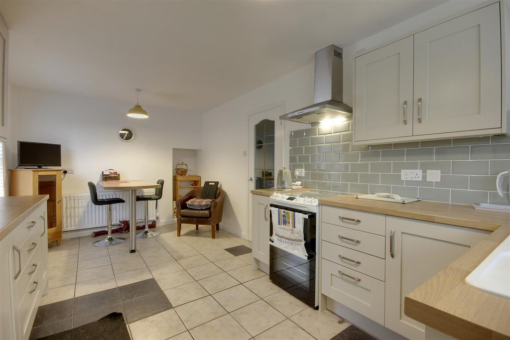 Property photo 3 of 11 Dining Kitchen