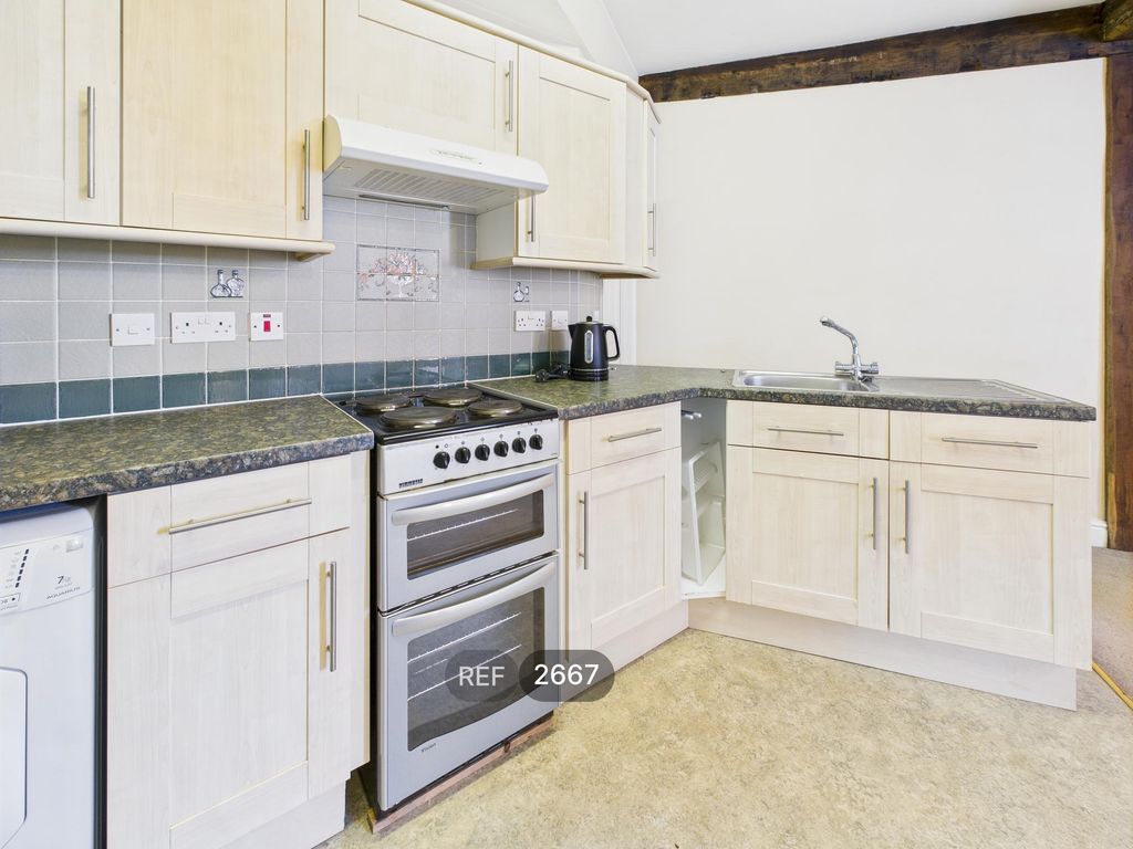 Property photo 3 of 15 Kitchen/Living Area