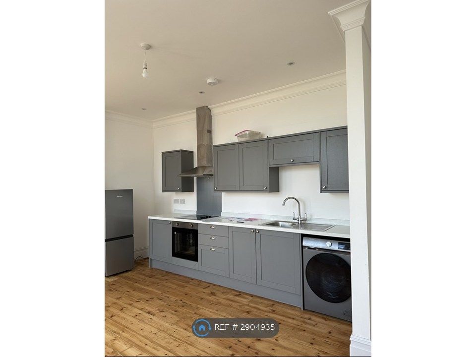 Property photo 2 of 8 Kitchen Living