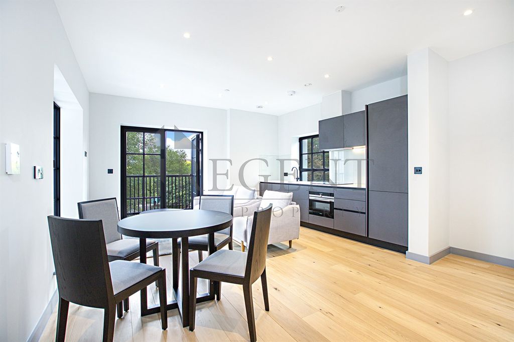 Property photo 2 of 8 Kitchen &amp; Dining