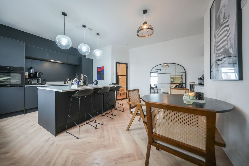Property photo 1 of 12 Dining Kitchen