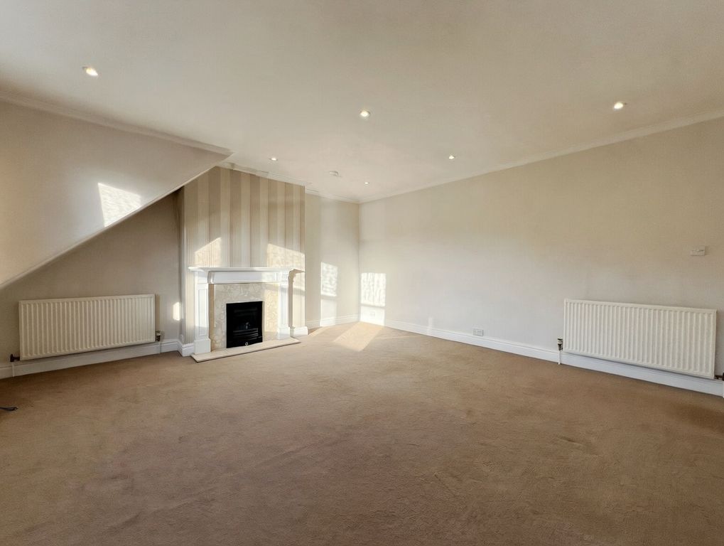 Property photo 3 of 12 Living Room