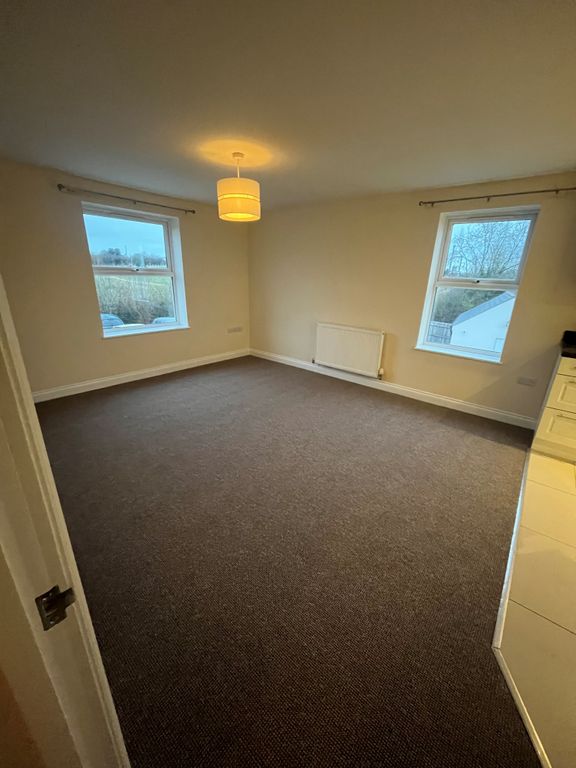 Property photo 2 of 9 Living Area