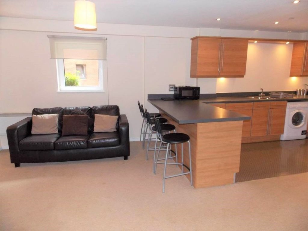 Property photo 3 of 8 A Modern Open-Plan Living Area Featuring A Comfort...
