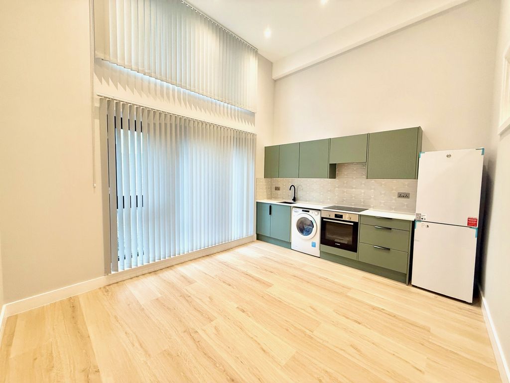 Property photo 1 of 4 Kitchen Living