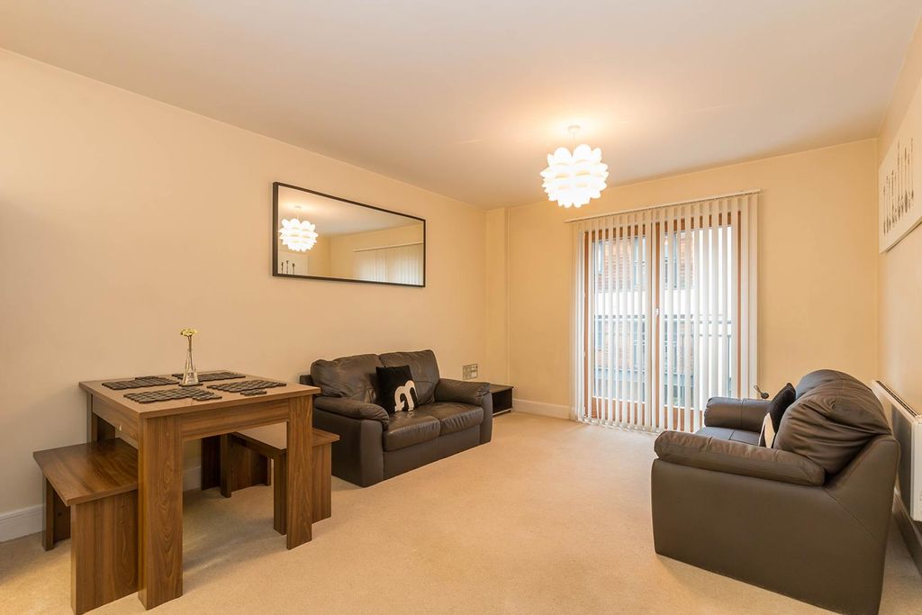 Property photo 3 of 11 Living Area