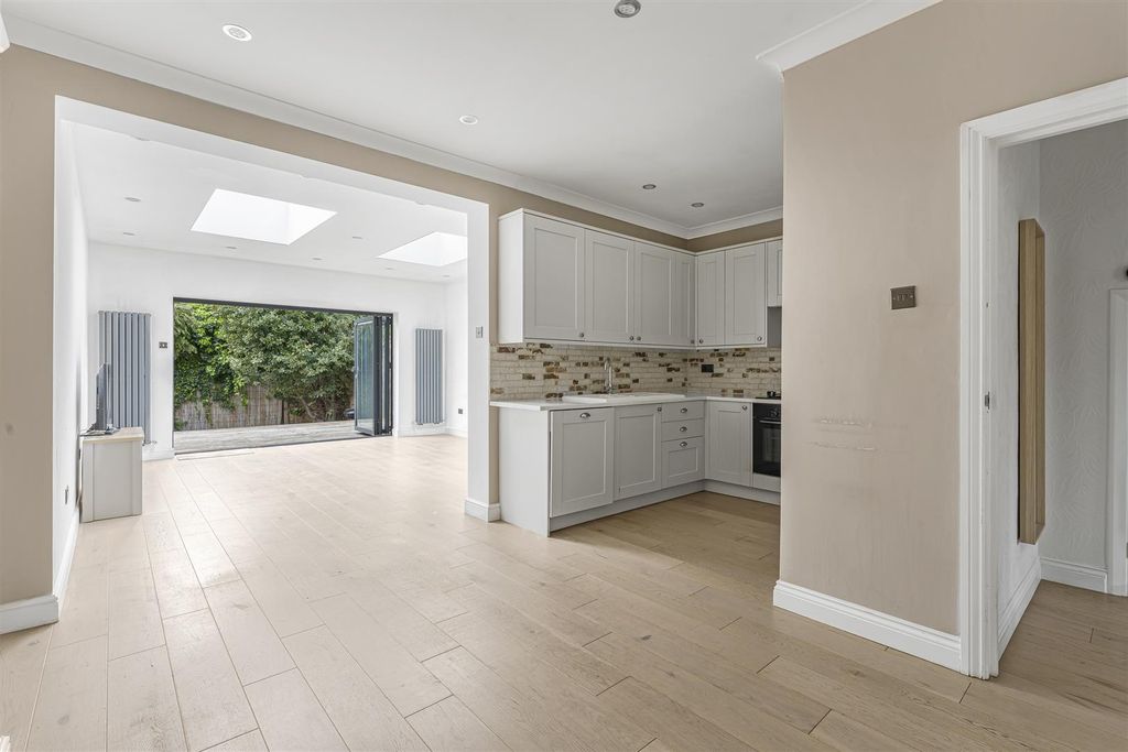 Property photo 3 of 12 Kitchen &amp; Living