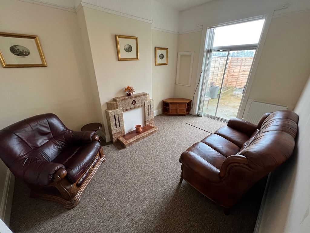 Property photo 3 of 12 Living Room