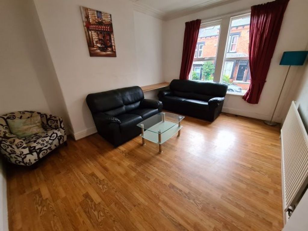 Property photo 2 of 9 A Spacious Living Room With Wooden Flooring, Two B...