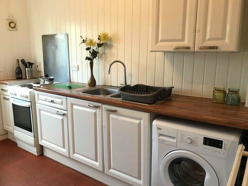 Property photo 2 of 5 A Clean, Well-Maintained Kitchen Featuring White c...