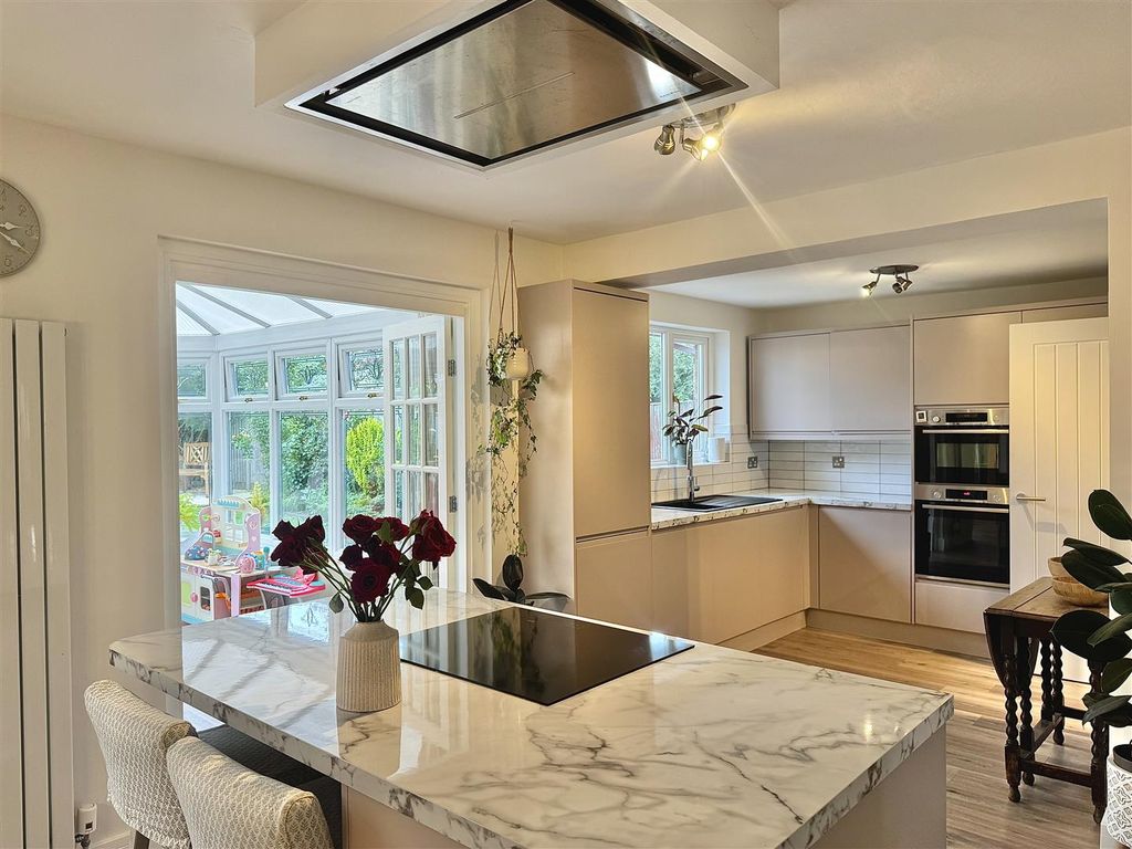 Property photo 3 of 23 Through Dining Room & Kitchen