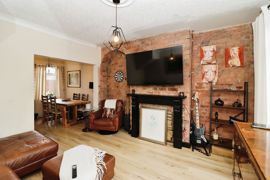 Property photo 2 of 12 Living Area
