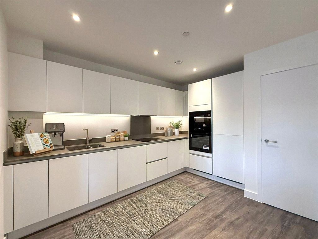 Property photo 2 of 11 Kitchen Living Area