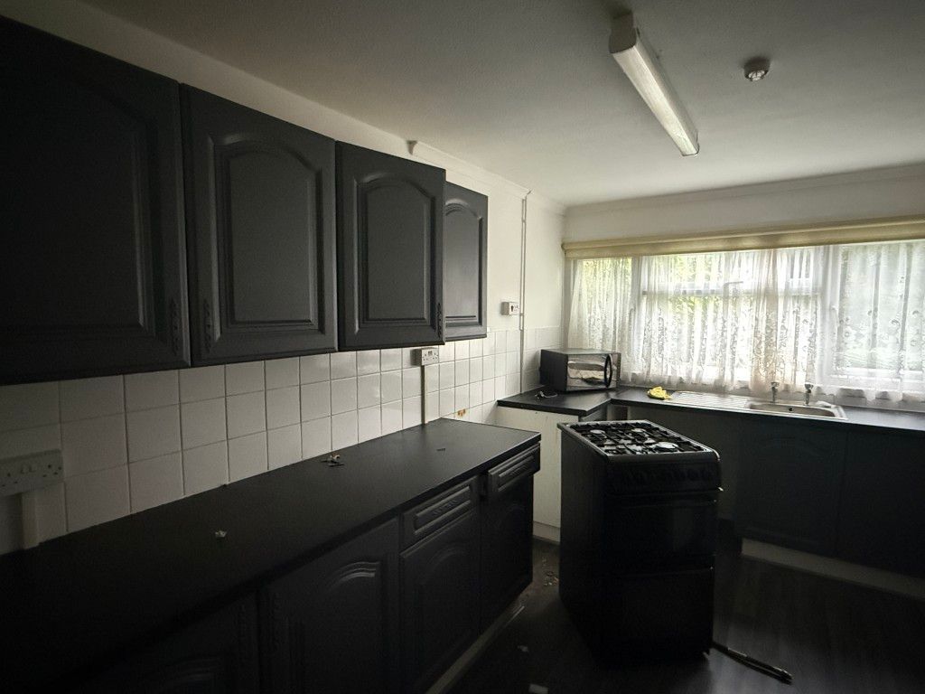 Property photo 2 of 10 Kitchen-Dining Room In House In Need Of Improvement
