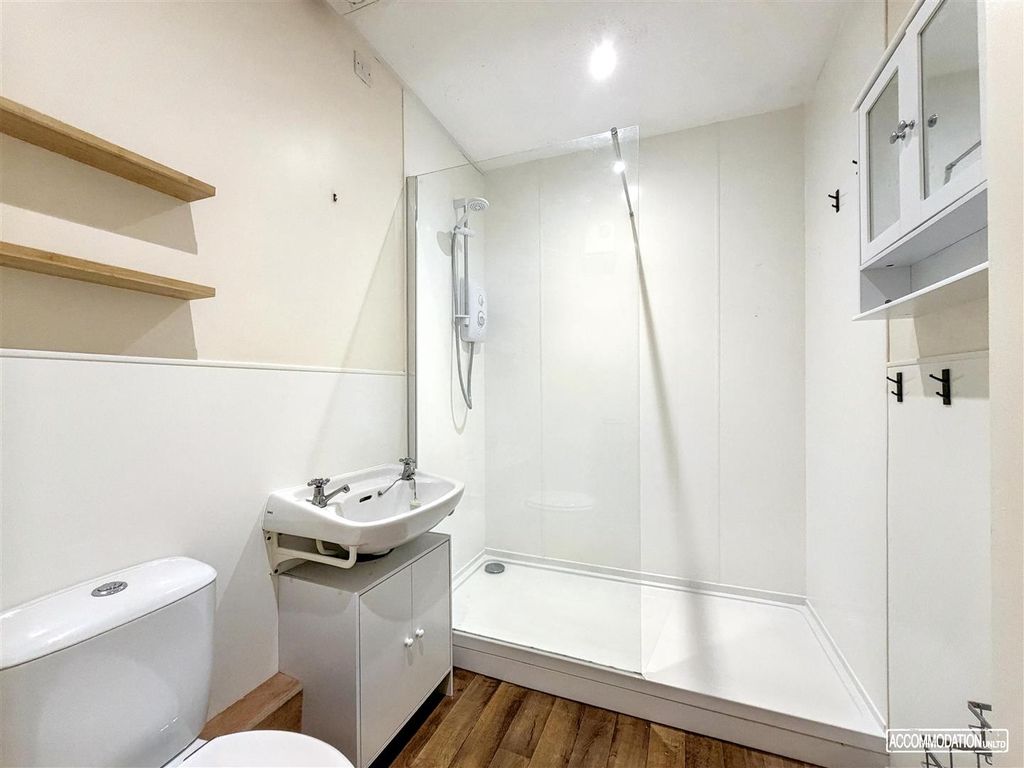 Property photo 1 of 8 Modern Bathroom With Spacious Walk-In Shower...