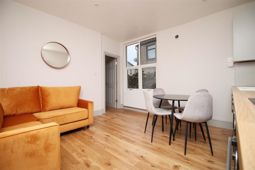 Property photo 2 of 8 Bright Living Area With Stylish Velvet Sofa...