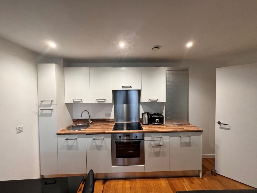 Property photo 2 of 11 Kitchen