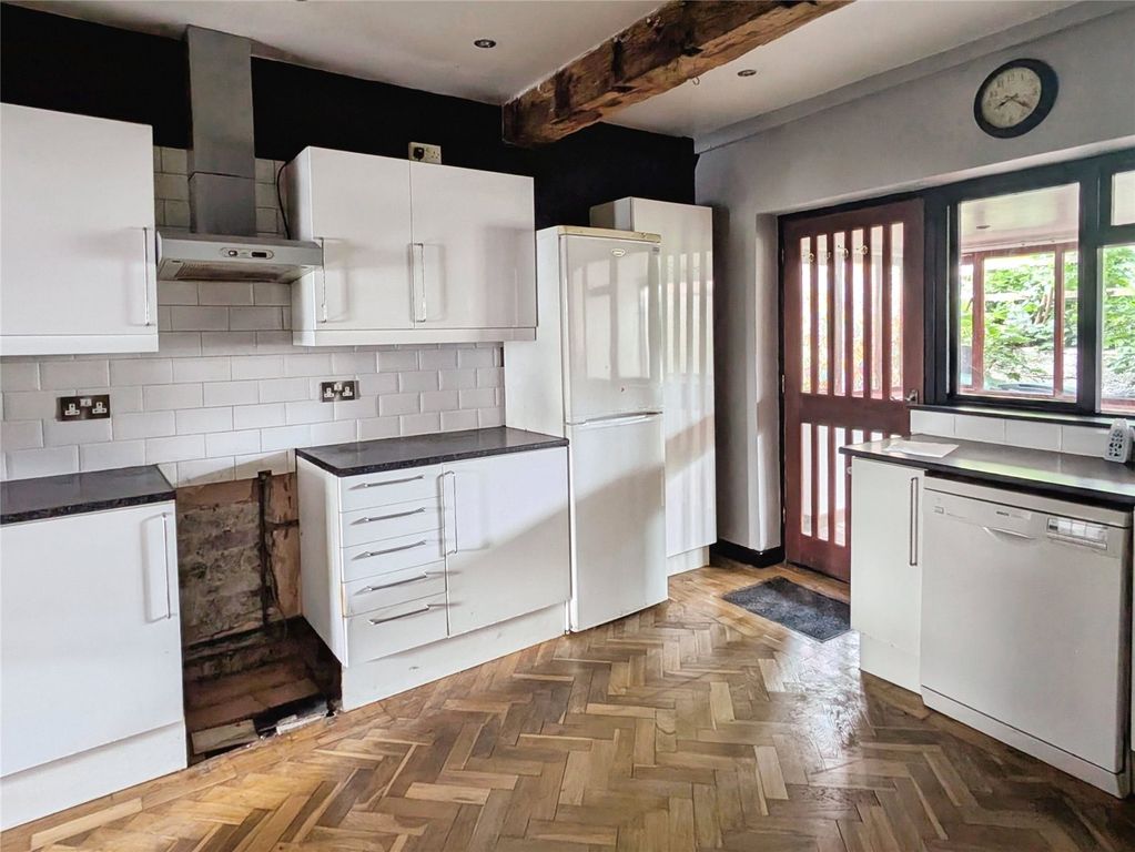 Property photo 3 of 8 Dining Kitchen