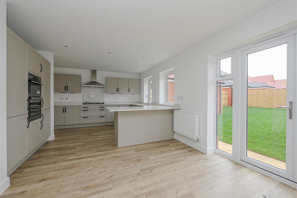 Property photo 3 of 19 Kitchen/Breakfast/Family Room