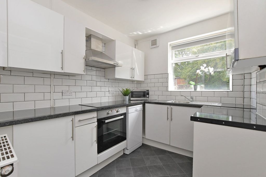 Property photo 1 of 12 Bright, Modern Kitchen With Glossy White Cabinets,...