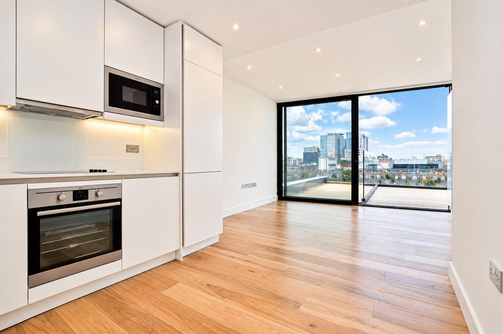 Property photo 1 of 10 Bright Minimalist Apartment With City Views.Png