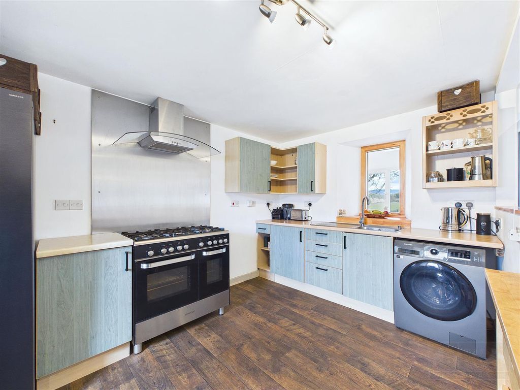 Property photo 2 of 34 Kitchen