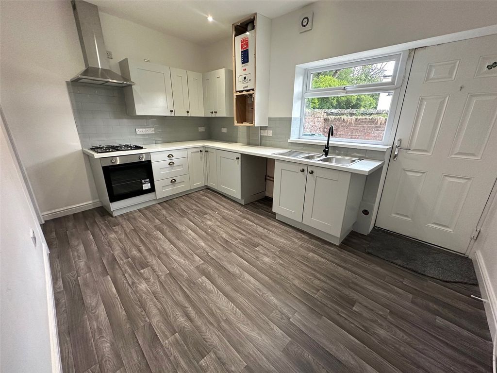 Property photo 3 of 13 Kitchen