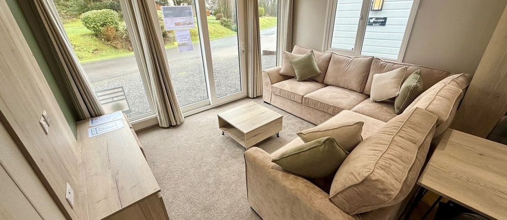 Property photo 2 of 9 Living Area With Patio Doors In The Victory Ripley Holiday Caravan At New Minerton Leisure Park, Pembrokeshire