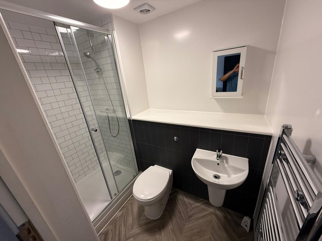 Property photo 2 of 4 This Modern Bathroom Suite Features A Sleek Design...