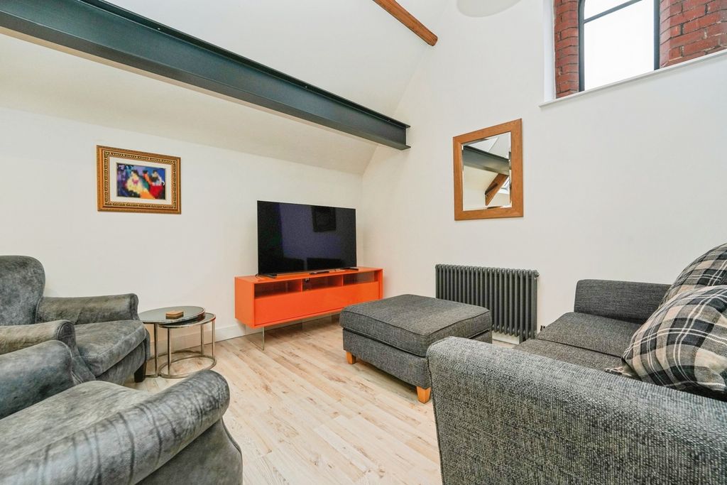 Property photo 3 of 15 Living Area