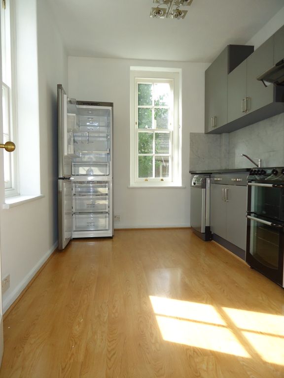 Property photo 3 of 7 Kitchen