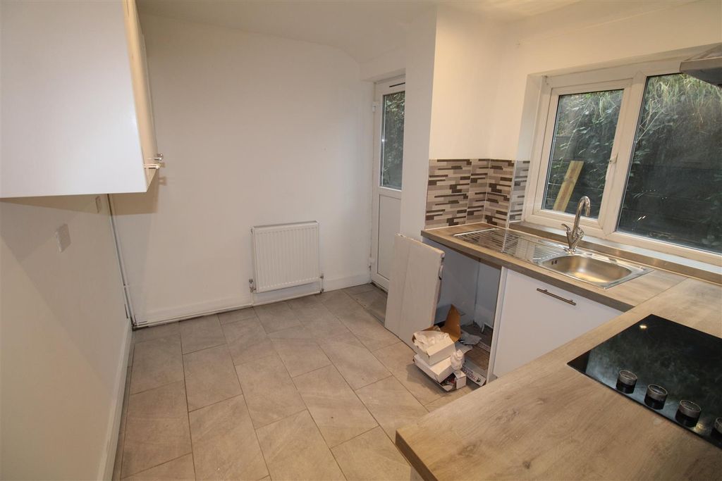 Property photo 3 of 13 Bright Kitchen With Modern Tiling And Workspace...