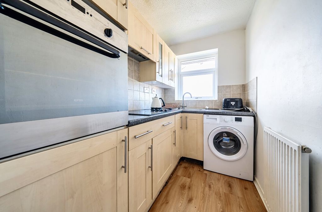 Property photo 3 of 12 Galley Kitchen