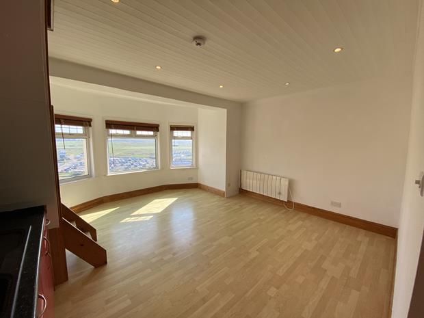 Property photo 3 of 10 Dining/Living Area