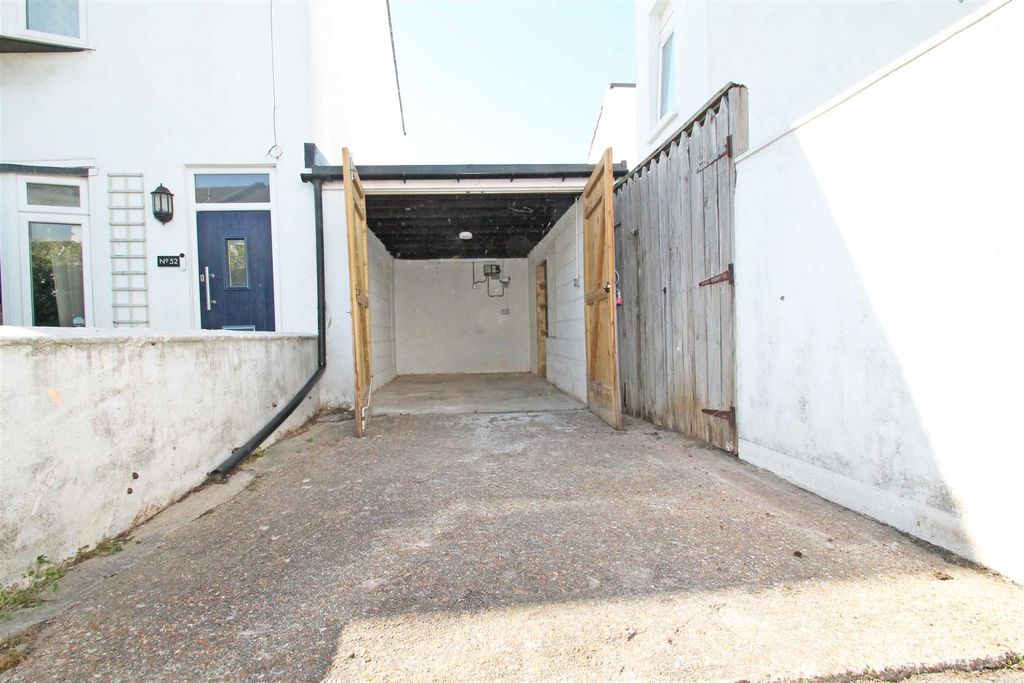 Property photo 2 of 3 Garage &amp; Driveway