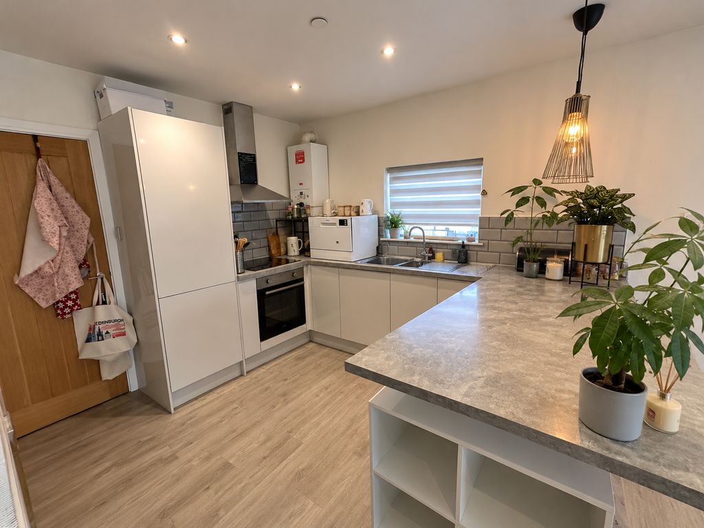 Property photo 3 of 7 Kitchen
