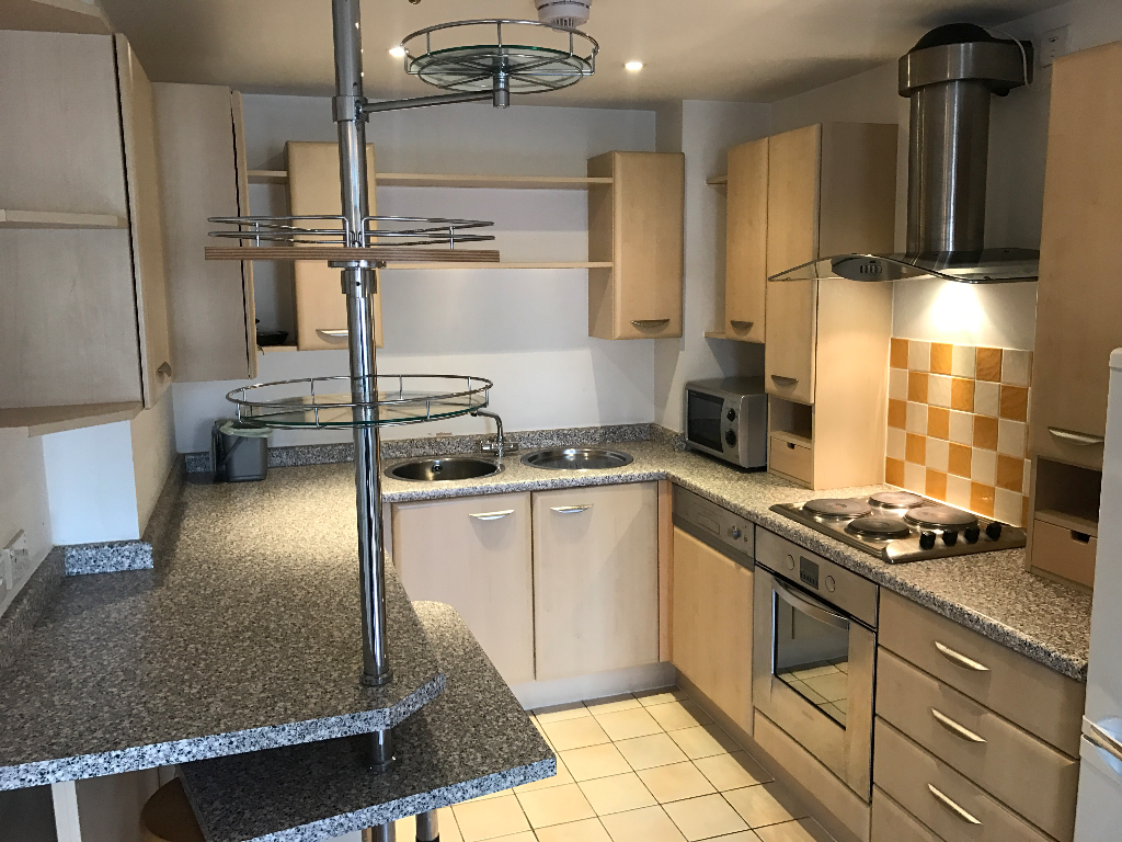 Property photo 2 of 8 Modern, Well-Equipped Kitchen