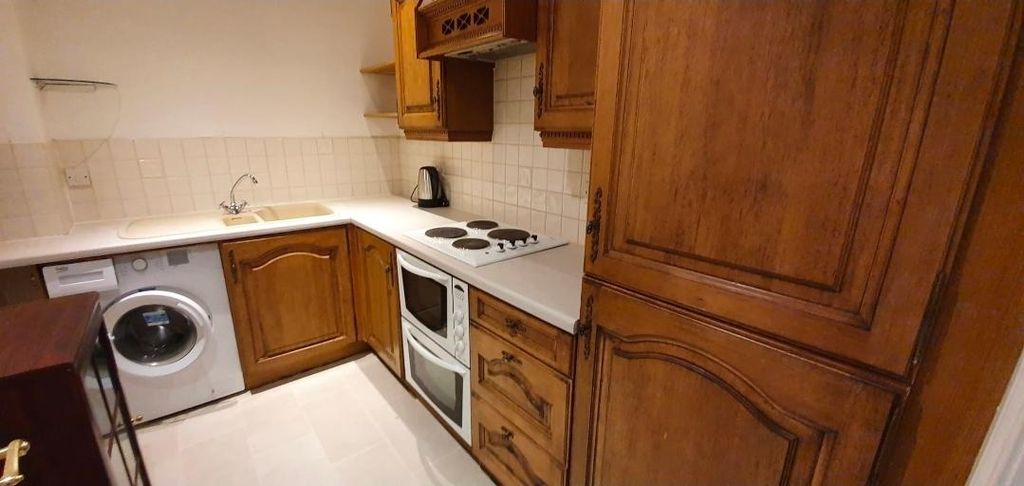 Property photo 2 of 19 Bright Kitchen With Classic Wooden Cabinets...